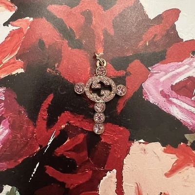 Gold Tone And Pink And Rhinestone GG Cross Charm Pendant - Image 1 of 4