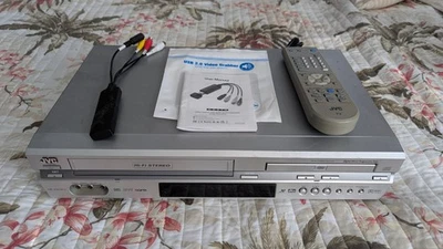 JVC HR-XVC27U DVD and VHS Player w/ remote and video transfer cables - Image 1 of 4
