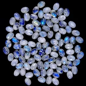 Lote de 100 cabujón ovalado calibrado piedra lunar arco iris de 99 quilates 5x7 mm #1594 - Imagen 1 de 6