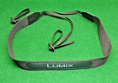 NUEVO Correa para el cuello de cámara Panasonic Lumix negra/blanca de 1" sin usar Foto 1 de 4