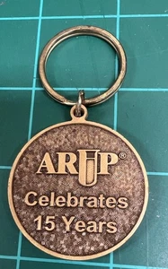 Llavero comercial de bronce ARUP - Imagen 1 de 3