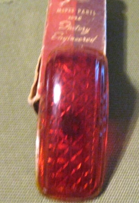 Lente luz trasera izquierda NOS Mopar 1941 Desoto, en caja original Foto 1 de 3