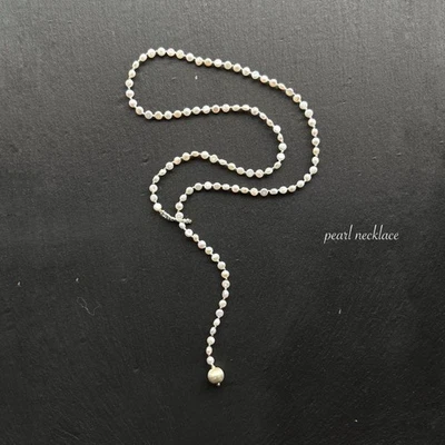 Collier long en argent perle d'eau douce et Karen avec grand pendentif... - Photo 1/4