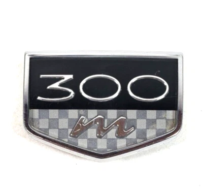 Chrysler 300M 1999-2004 emblema logotipo símbolo insignia guardabarros cromo OEM 04805287AD Foto 1 de 4