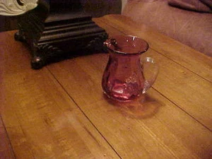 PILGRIM CRANBERRY GLASS PITCHER WITH AN APPLIED RIBBED HANDLE - Picture 1 of 3
