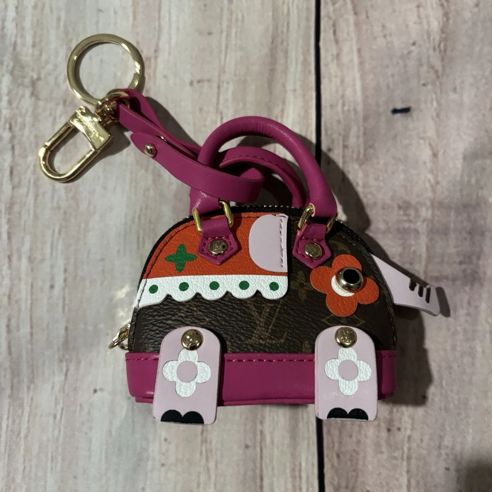 Louis Vuitton Monogram Coated Canvas Wild Puppet Elephant Keyholder/Bag Charm - Image 1 of 2