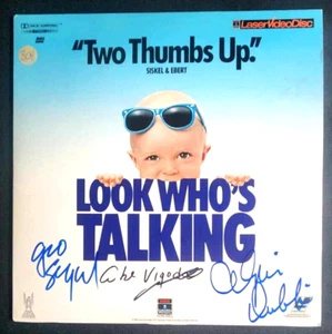 The "Look Who's Talking" laserdisc signed by Travolta, Dukakis, Segal, & Vigoda - Imagen 1 de 2