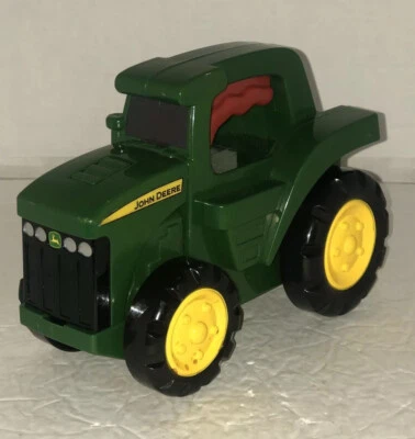 Learning Curve JOHN DEERE TOY FLASHLIGHT TRACTOR W/ SOUNDS - Image 1 of 4