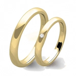 Coppia di fedi in oro giallo 9 carati con diamante. Fedi nuziali economiche - Foto 1 di 3