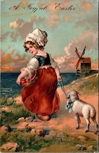 Cesta de huevos de niña bonita deseos de Pascua de la década de 1910 cordero molino de viento postal en relieve J36 - Imagen 1 de 2