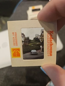 #DT 35mm slide - Vintage - Collectibles - Photo - Houses Car Hill Green grass - Picture 1 of 1