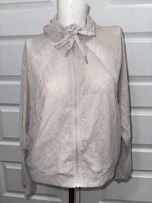 Chaqueta transparente de encaje profundo Lululemon para mujer con cremallera frontal talla 6 Foto 1 de 4