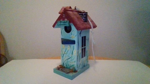 Harold`s Folly, bird house, wood, green, flowered, maroon roof,chimney Cover