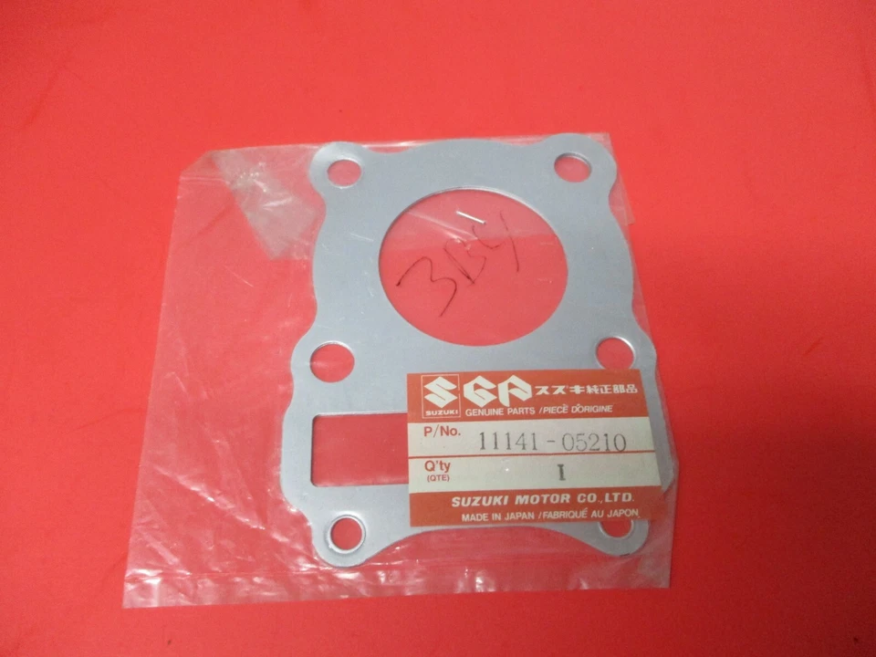 JUNTA DE CABEÇA DE CILINDRO SUZUKI DR100 SP100 ORIGINAL NOVA SEM FABRICANTE DE EQUIPAMENTO ORIGINAL 11141-05210 - Imagem 1 de 1