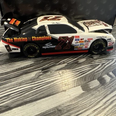 Dave Marcis #71 Team Realtree Camouflage Making Of Champions 1997 Chevy MC Bank - Image 1 of 4