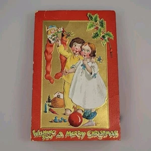Tuck Crimson and Gold Francis Brundage Christmas Stockings c1910 Postcard - Picture 1 of 4