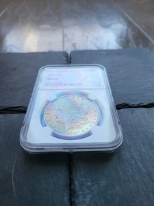 1882 Morgan Silver Dollar NGC MS63 Rainbow Toned - Picture 1 of 3