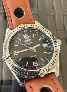 BREITLING Wings A10050 Data Quadrante Nero Automatico Uomo - 796799 - Imagen 1 de 7