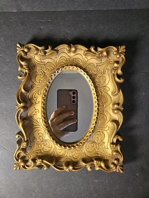 Vintage Hollywood Regency Victorian Gold Tone Plastic Oval Inset Mirror - Image 1 of 4