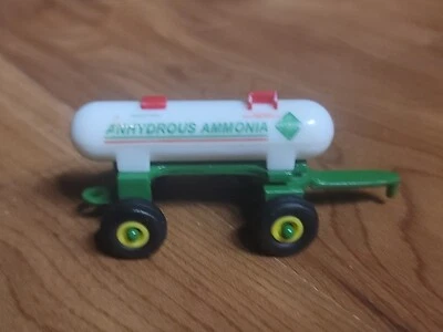 ERTL John Deere 1:64 Anhydrous Ammonia Tractor Tank Trailer Yellow Rims 3" Toy - Image 1 of 4