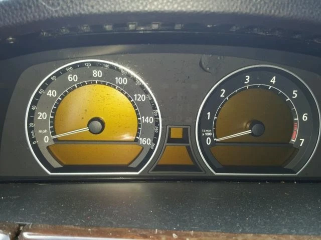 Conjunto de faros izquierdos usados se adapta a: BMW 745I 2005 xenón ámbar lente giratoria grado izquierdo Foto 1 de 4