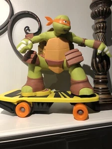 Teenage Mutant Ninja Turtle Michael On Skateboard (No Remote) - Picture 1 of 3