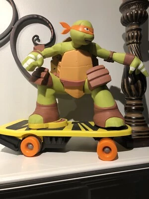 Teenage Mutant Ninja Turtle Michael On Skateboard  (No Remote) - Image 1 of 3