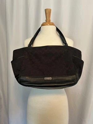 Auténtico bolso de mano Coach #23297 Parker Signature de cuero negro y jacquard Foto 1 de 4