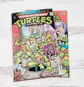 1988 Eastman and Laird's Teenage Mutant Ninja Turtles Adventures set a fumetti - Foto 1 di 12