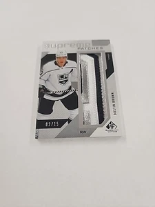 2021-22 Upper Deck SP Game Used Supreme Patch 2/15 Dustin Brown #SP-DB Patch ZD - Bild 1 von 3