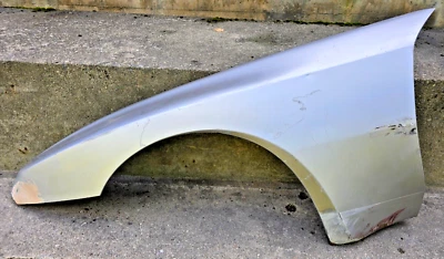 BONITO GUARDABARROS DELANTERO IZQUIERDO USADO ORIGINAL GENUINO PORSCHE 944 944S PLATEADO 1983-89 Foto 1 de 4