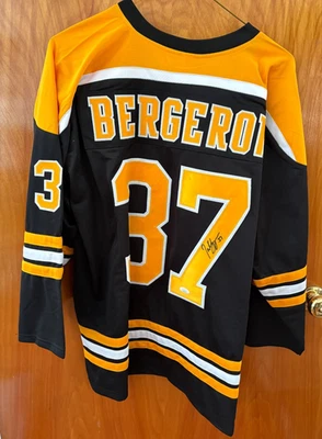 Patrice Bergeron AUTOGRAPHED JERSEY (JSA) CERT Boston Bruins SCC 2011 5x SELKE - Image 1 of 4