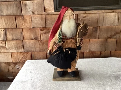 Arnett's Country Store Santa Holding Stick Horse/Black Bag/Tree 20" - Image 1 of 4
