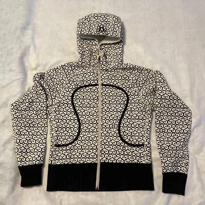 Chaqueta con Capucha Lululemon Buceo Cremallera Mujer Estampado Corazón Borde Negro Preppy Foto 1 de 4