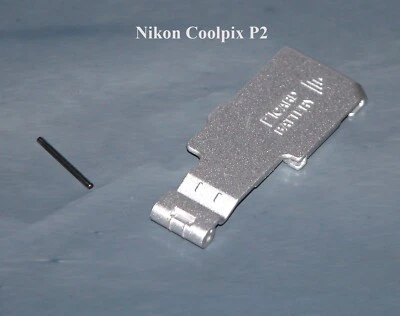 Porta/tampa de bateria para câmera digital Nikon Coolpix P2 - Peças de reparo para câmera - Imagem 1 de 2