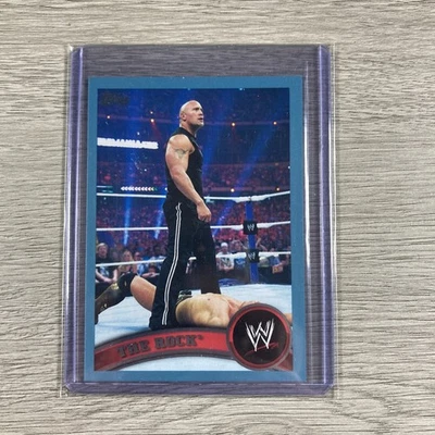 2011 Topps WWE Wrestling Blue Border Parallel Card The Rock Numbered /2011 #82 - Image 1 of 2