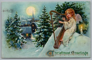 Postcard Christmas Greeting Angel Playing Harp Moonlit Village *A3758 - Picture 1 of 2