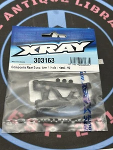 XRay. 303163 rear suspension arm - hard - 1-hole - v2 - Picture 1 of 1