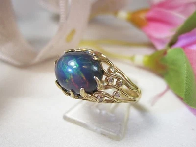 Excelente anillo de boda de oro de 14k natural etíope de ópalo negro y diamantes cultivados en laboratorio Foto 1 de 4