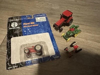 Lote de 4 tractores Ertl 1/64 Case IH Ford John Deere Foto 1 de 4