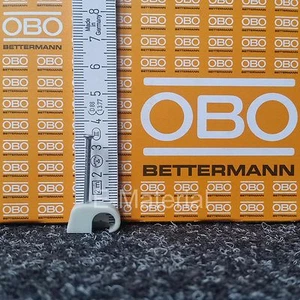 200x Nagelschellen 7-12mm OBO Bettermann 2026-35 LGR SP für z.B. NYM 3x1,5-5x1,5 - Bild 1 von 5