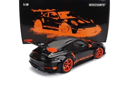 Porsche 911 992 GT3 RS 2022 cupé negro con llantas naranjas escala 1:18 Foto 1 de 4