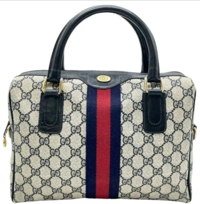 Auténtico bolso vintage Gucci GG Plus Supreme Web Boston de lona recubierta azul  Foto 1 de 4