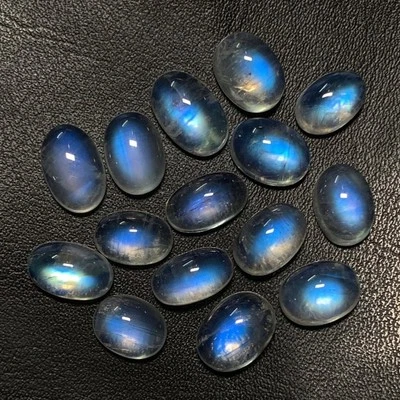 AAAAAA  Blue Flashy Fire Rainbow Moonstone Oval Shape Cabochon Size7x10-8X12.5MM - Image 1 of 4