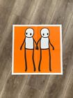 Stik Orange Print / Holding Hands . Perfect Condition WITH NEWSPAPER