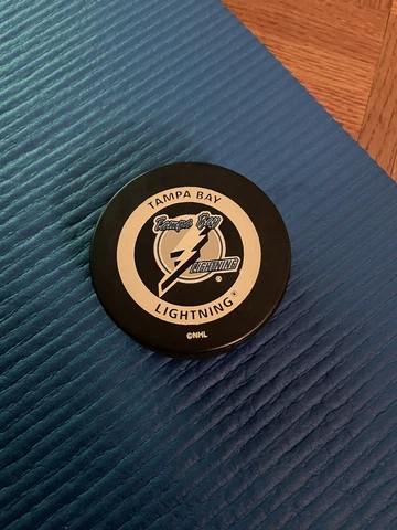 Tampa Bay Lightning  Inglasco Official Game Puck - Orange Ring Back Cover