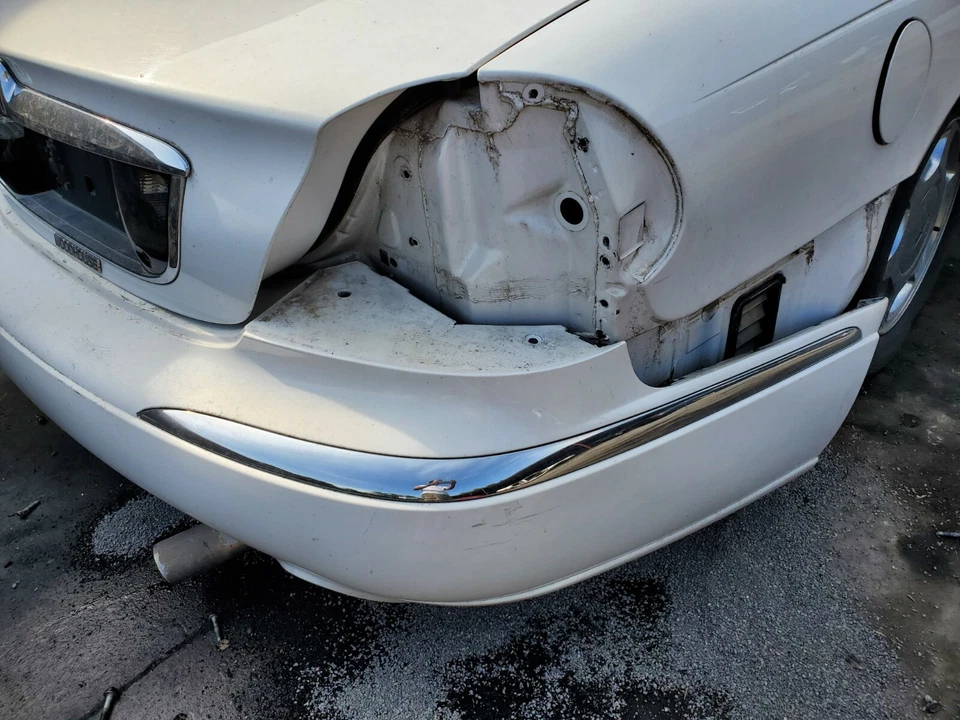 1998-1999-2000-2001-2002 LINCOLN CONTINENTAL RIGHT REAR BUMPER CHROME MOLDING  - Image 1 of 1