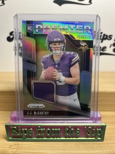 2024 Panini Prizm - Premier Jerseys J.J. McCarthy #PJ-JJM (MEM, RC) - Bild 1 von 2