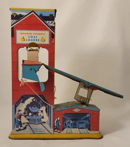 Giocattolo litografico latta caricatore carbone automatico Wolverine vintage - Foto 1 di 12
