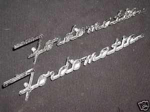 FORD FORDMATIC (2) EMBLEMA ORIGINAL PLACA DE ESCRITURA 8" DE LARGO - Imagen 1 de 1